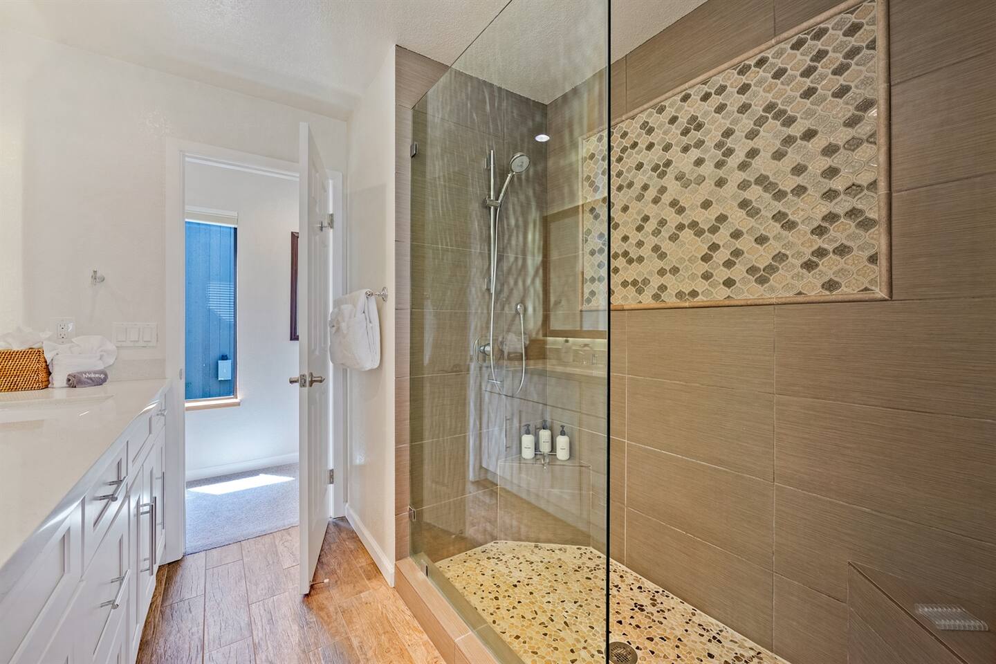 Spa-like hall bathroom shower. Shampoo, conditioner, and body wash are provided.