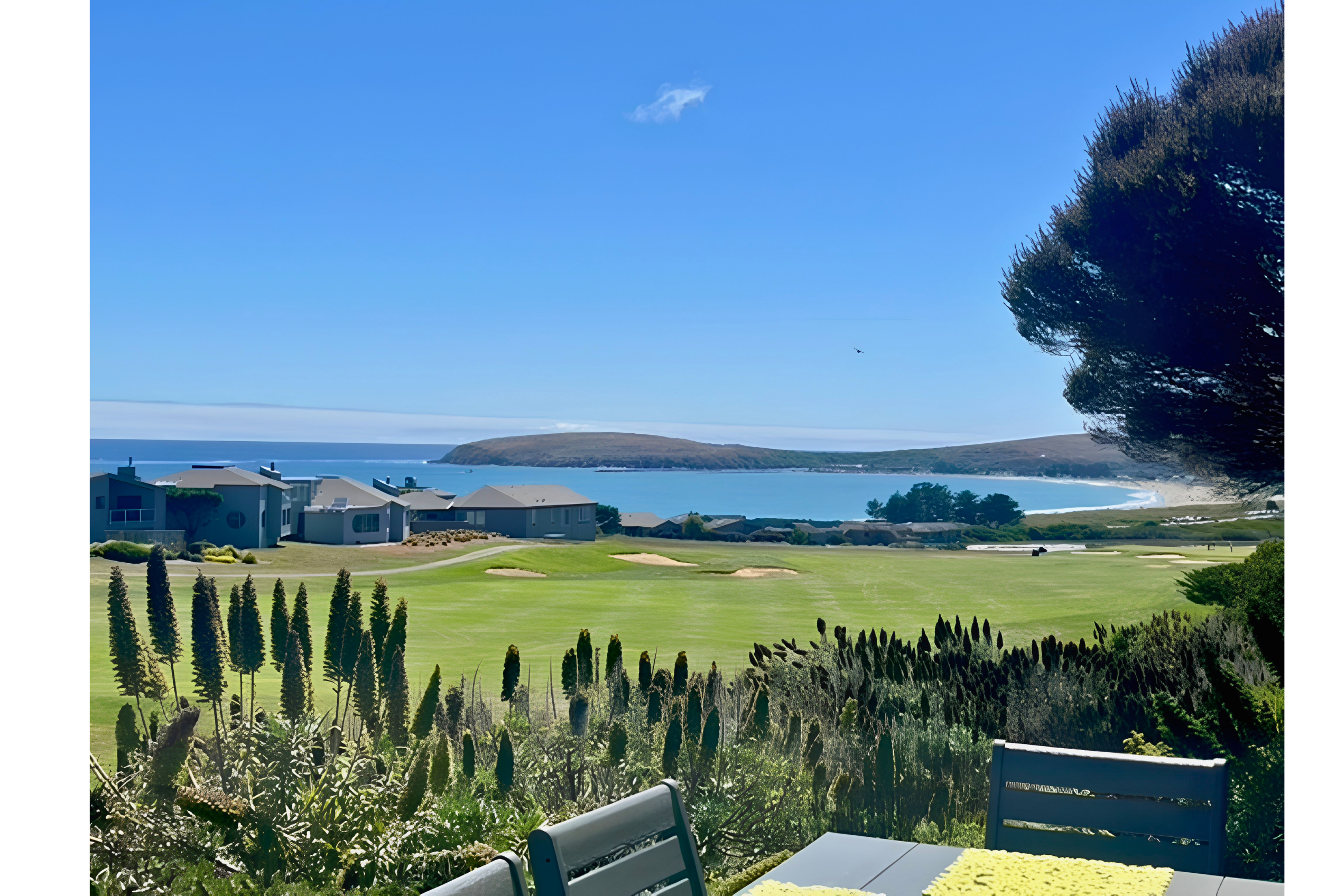 Patio views over the golf course with stunning sea vistas