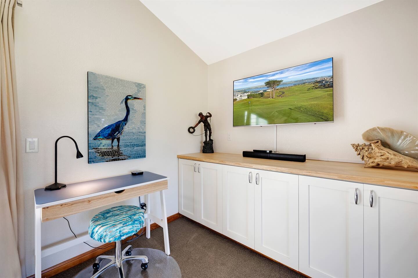 The primary bedroom has a remote work space.