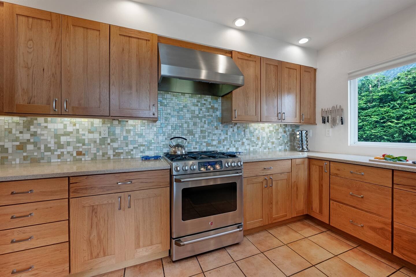 The gourmet kitchen is equipped with all the utensils, pots, pans, dishes you'll need, and more.