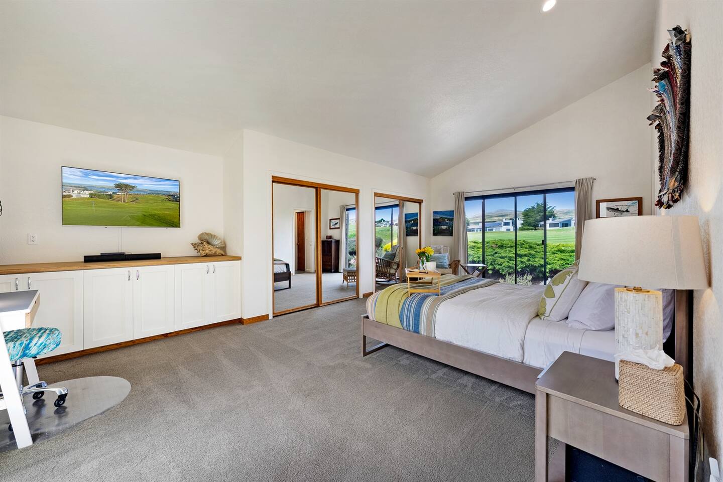 Plenty of closet space and a large TV in the primary bedroom.