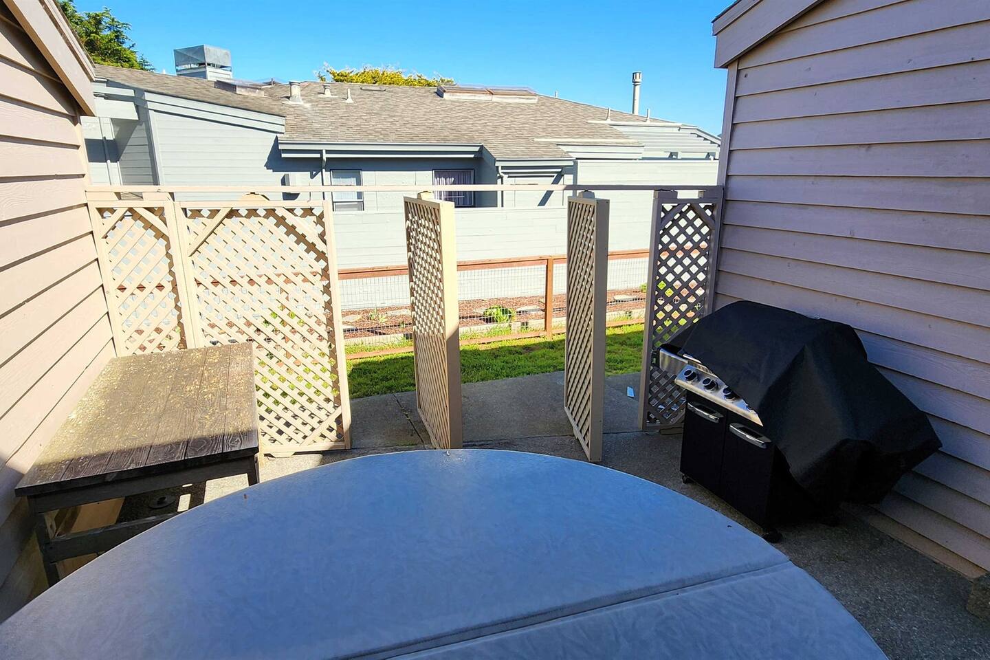 The center courtyard gate opens to the large private dog run in the side yard.