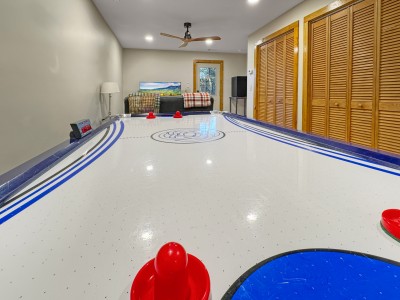 Downstairs game room with air hockey at Das Fischer Haus