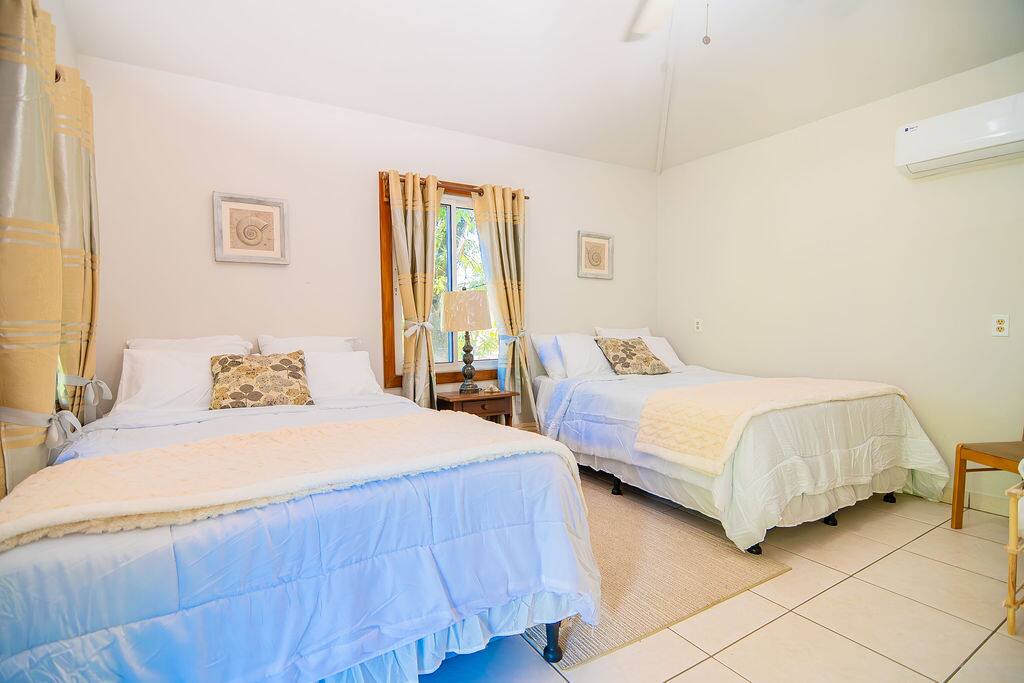 2 beds | Steps to West Bay Beach & Shared Pool!