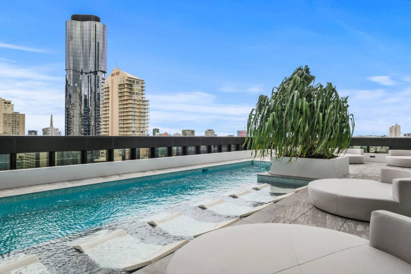 Dive into stunning views while lounging by the chic pool! Perfect for sunny days.