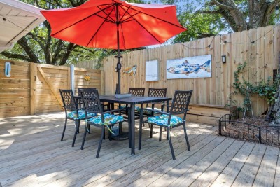 Secluded deck and spacious back patio and deck by the Grill.