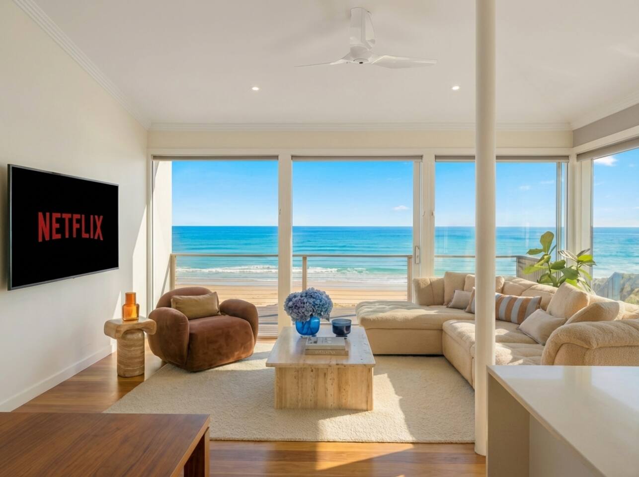 Floor-to-ceiling windows framing uninterrupted ocean views