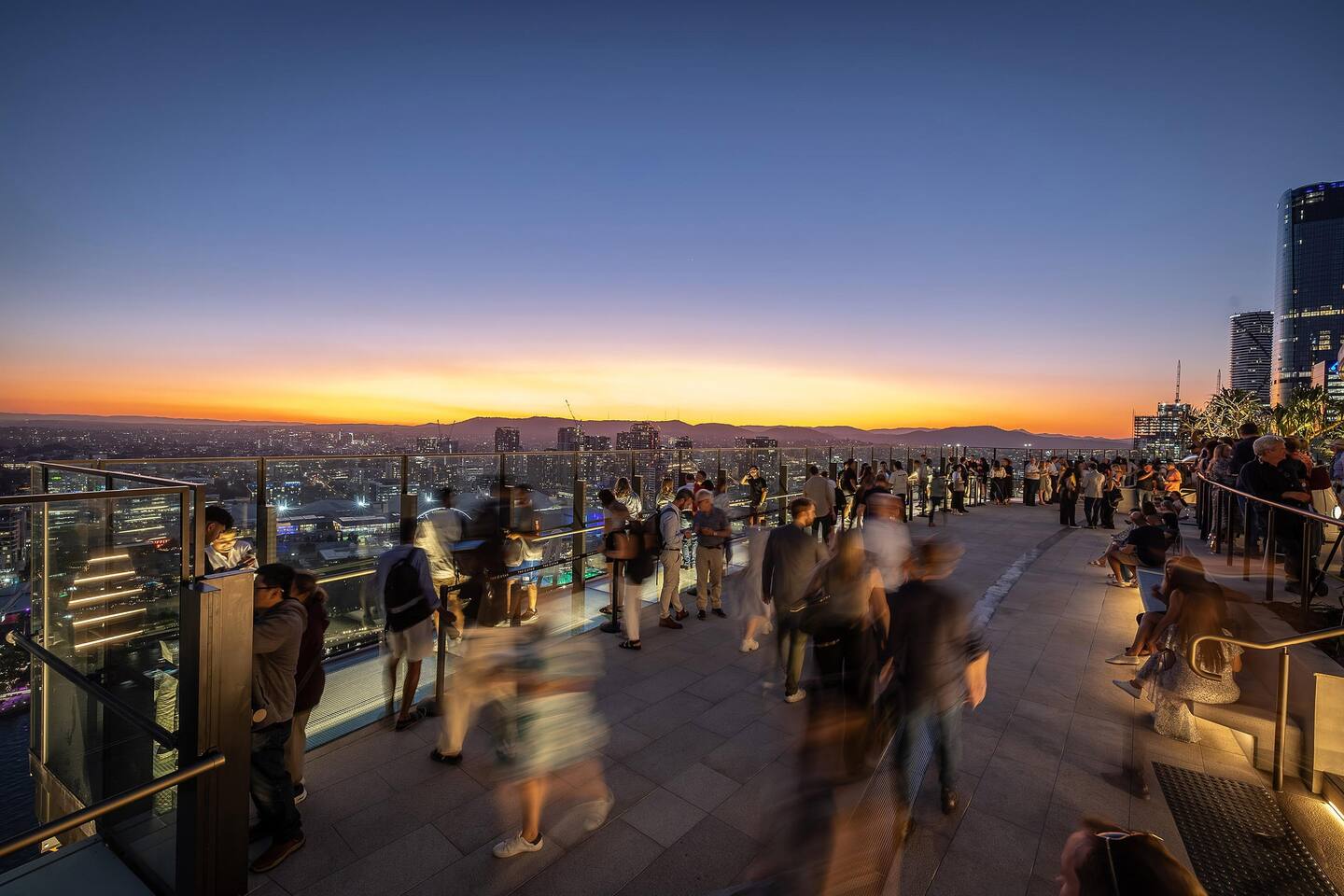 Skyline Oasis: Unwind at this vibrant rooftop with stunning Brisbane views at sunset!