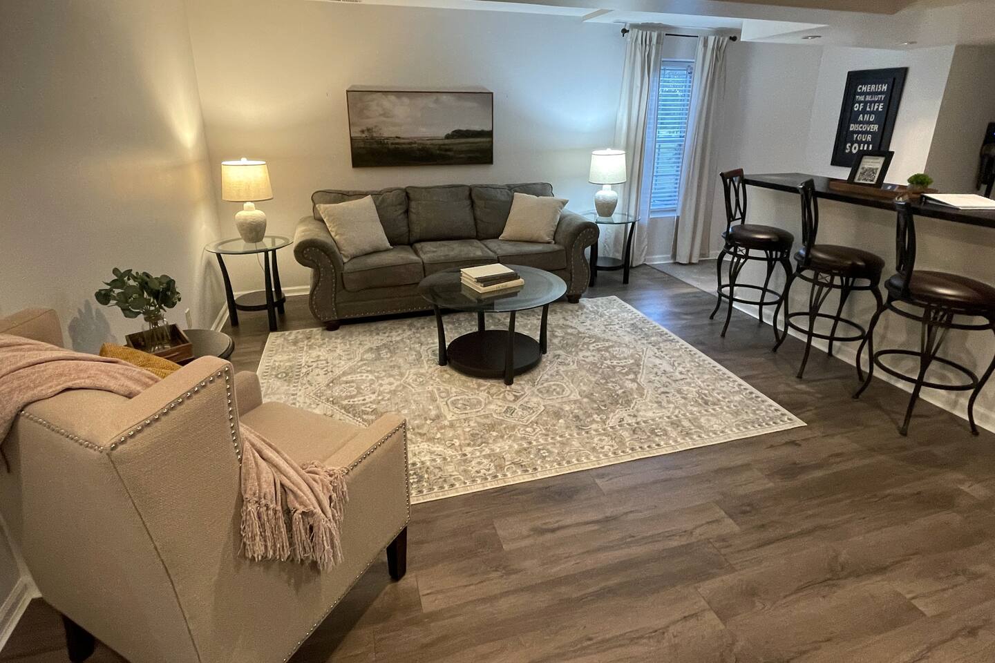 Spacious living room with bar and 65" smart TV