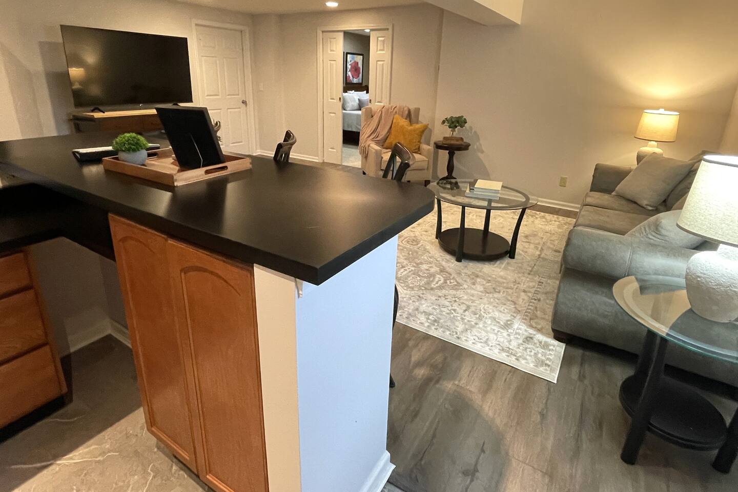 Spacious living room with bar and 65" smart TV