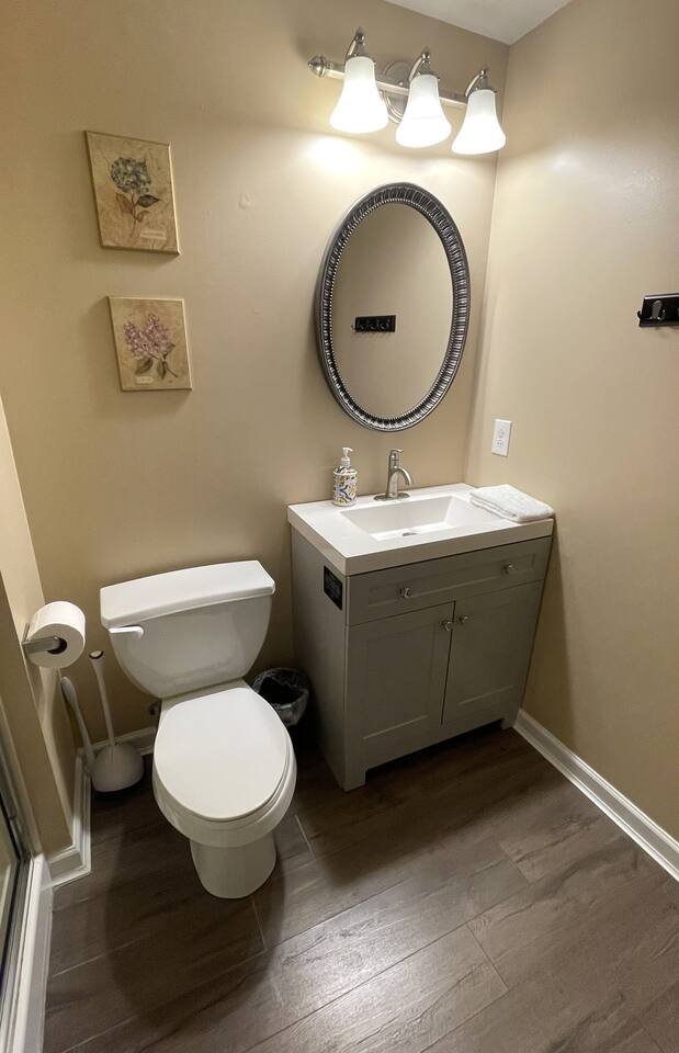 Full bathroom with shampoo, conditioner, and body wash provided