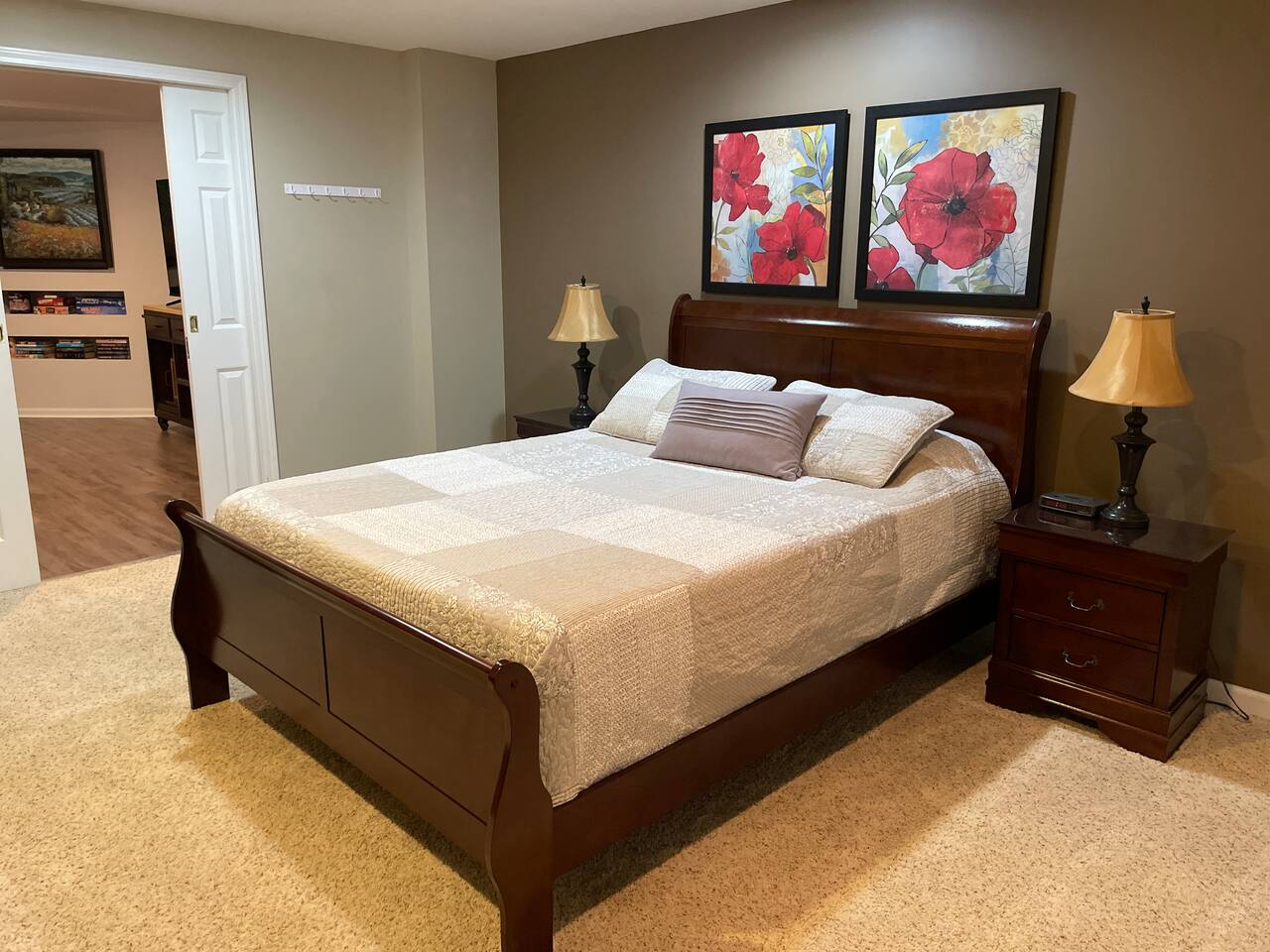 Enjoy a peaceful night's sleep in the beautifully furnished primary bedroom with a comfortable memory foam queen bed.