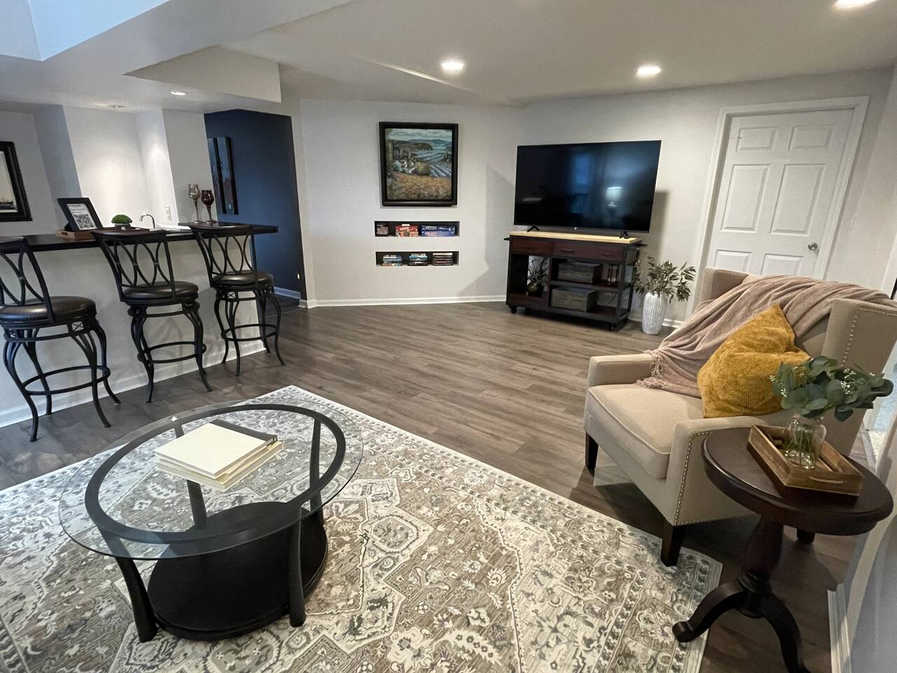 Spacious living room with bar and 65" smart TV
