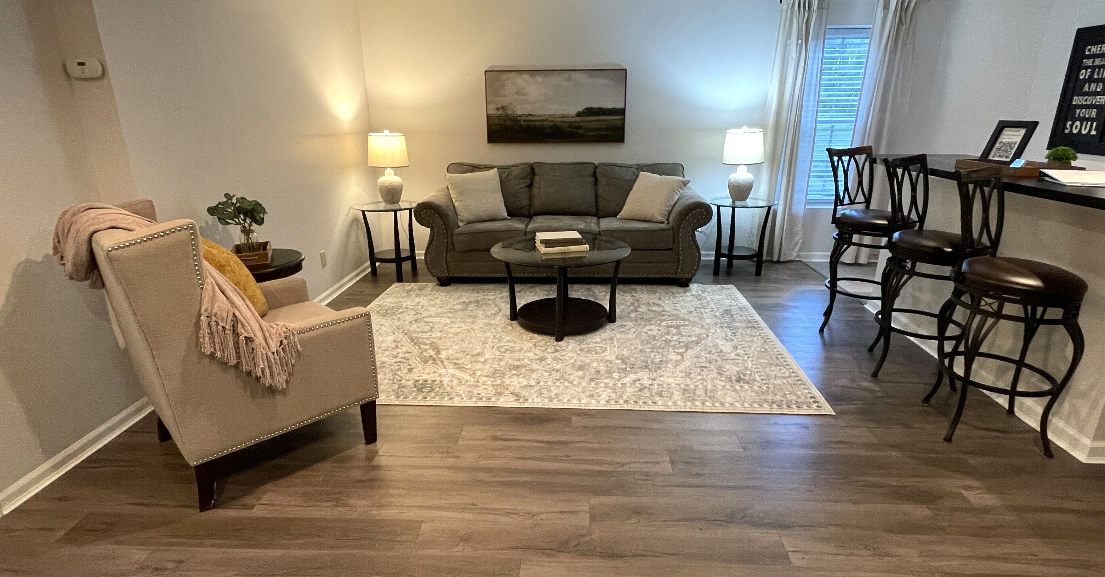 Spacious living room with bar and 65" smart TV