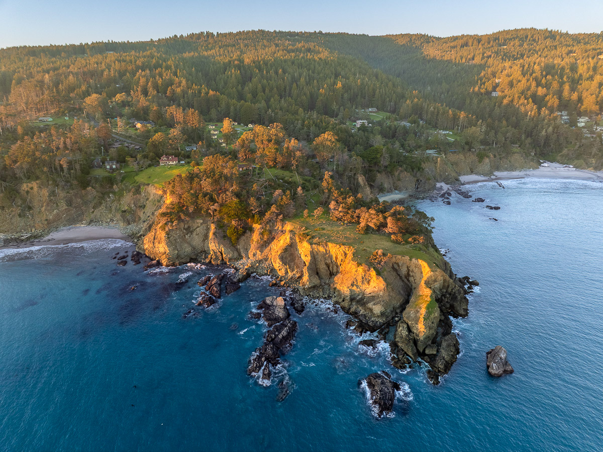 Dramatic bluff-top retreat with ocean vistas, coves, and sunsets.