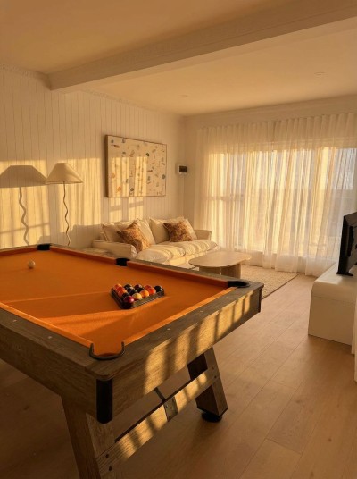 Sunlit lounge and pool table