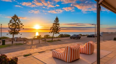 Sunset-facing terrace with loungers