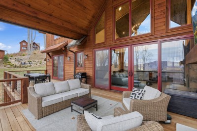 Relax on this covered deck with cushioned seating, mountain air, and peaceful views. It’s the perfect spot for coffee before hiking the Eagles Nest trails or winding down with a glass of wine after exploring downtown Banner Elk.