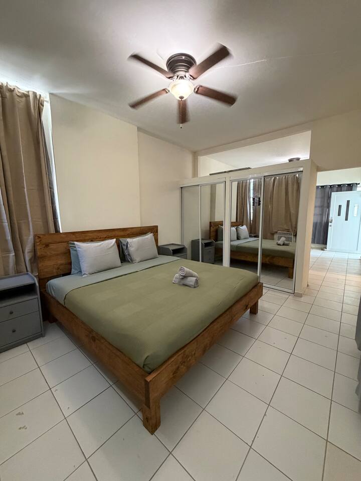 1 bedroom flex by the beach with pool, and garden