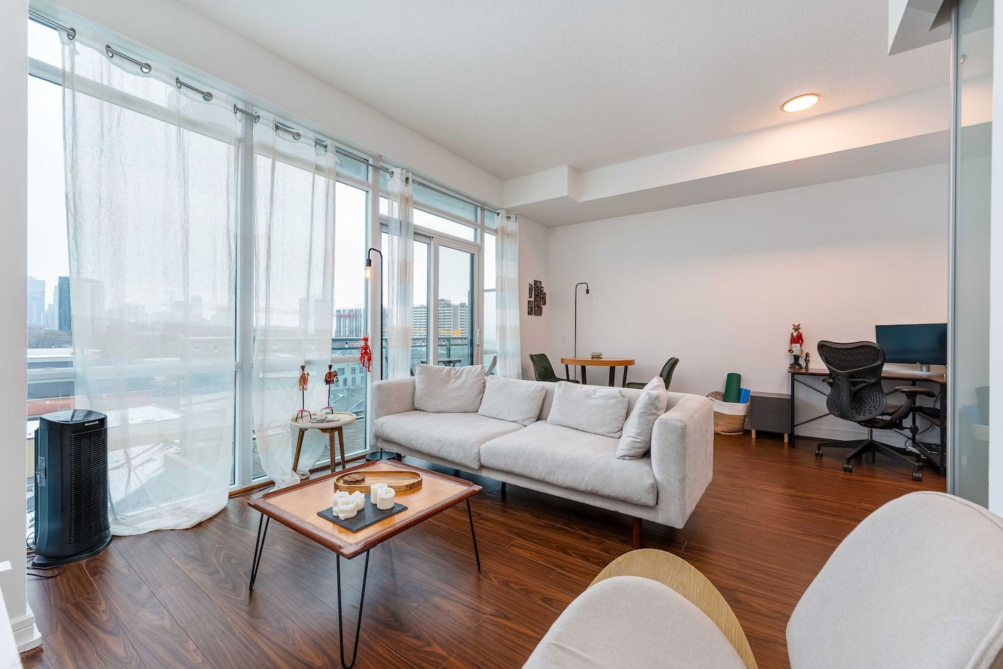 Modern 1BR + Den Condo with Sauna Access