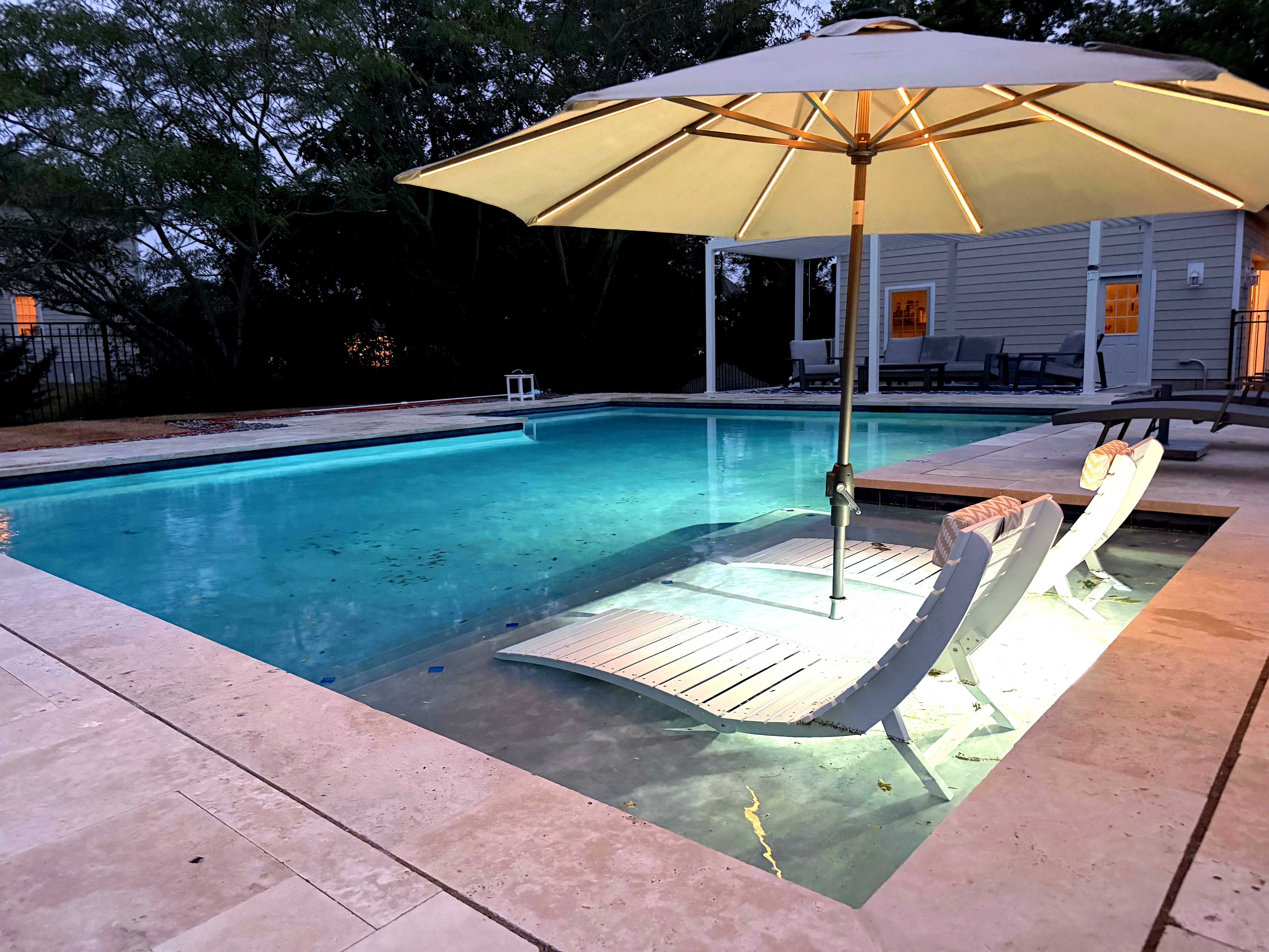 Private heated pool at dusk at Cape May Reserve