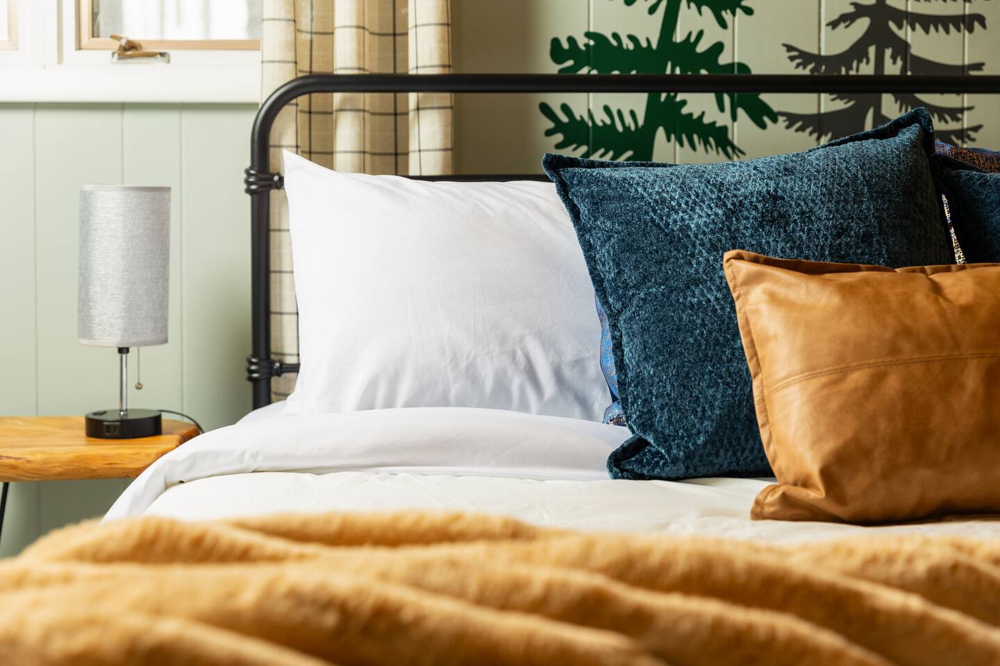 Second bedroom with forest wallpaper