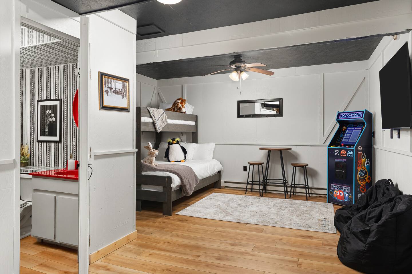 Bunk room with arcade and bean bags