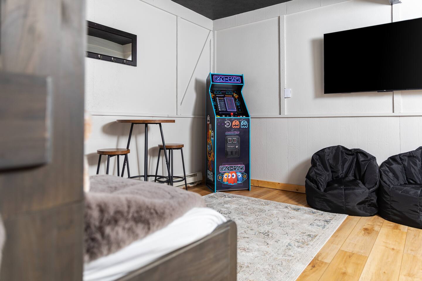 Bunk room with arcade and bean bags