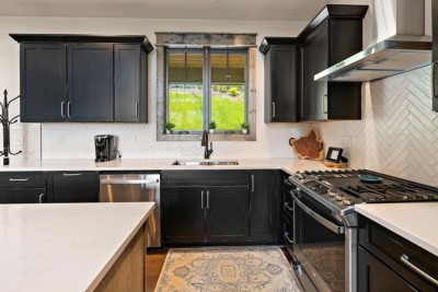 Morning sunlight pours through the kitchen window as coffee brews and the mountains quietly wake outside. It’s the kind of space that makes simple moments feel calm, cozy, and beautifully unhurried.