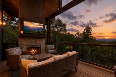 Settle into the plush wicker lounge chairs on the sunset deck, where a stone fireplace glows against sweeping mountain views. Flip on the mounted TV or just watch the ridgeline change color as the evening winds down.