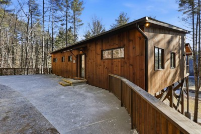 Arrive to a quiet forest escape where the cabin feels tucked away and peaceful. The private walkway sets the tone for a relaxing stay, letting you slow down the moment you step onto the property.