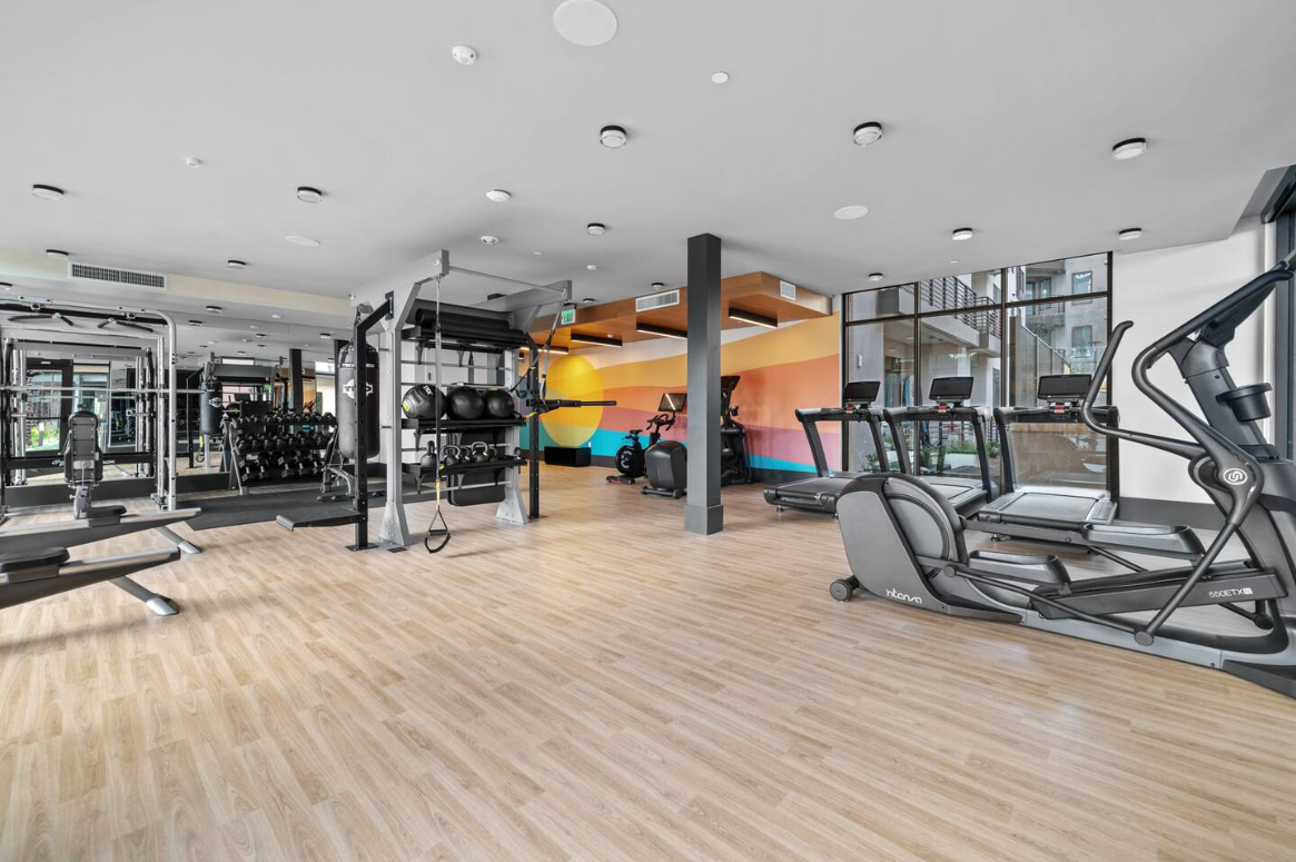 Modern, fully equipped fitness center with cardio and strength gear