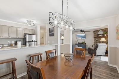 Enjoy shared meals and meaningful moments at the spacious dining table, perfect for family dinners, game nights, or planning the next day’s adventures in a bright and comfortable setting.