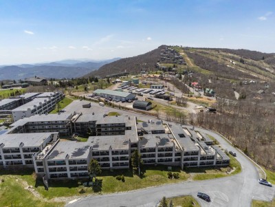 Experience a mountain retreat set within a scenic resort community, surrounded by rolling hills and fresh alpine air. Perfectly positioned for adventure, relaxation, and easy access to year-round activities and nearby attractions.