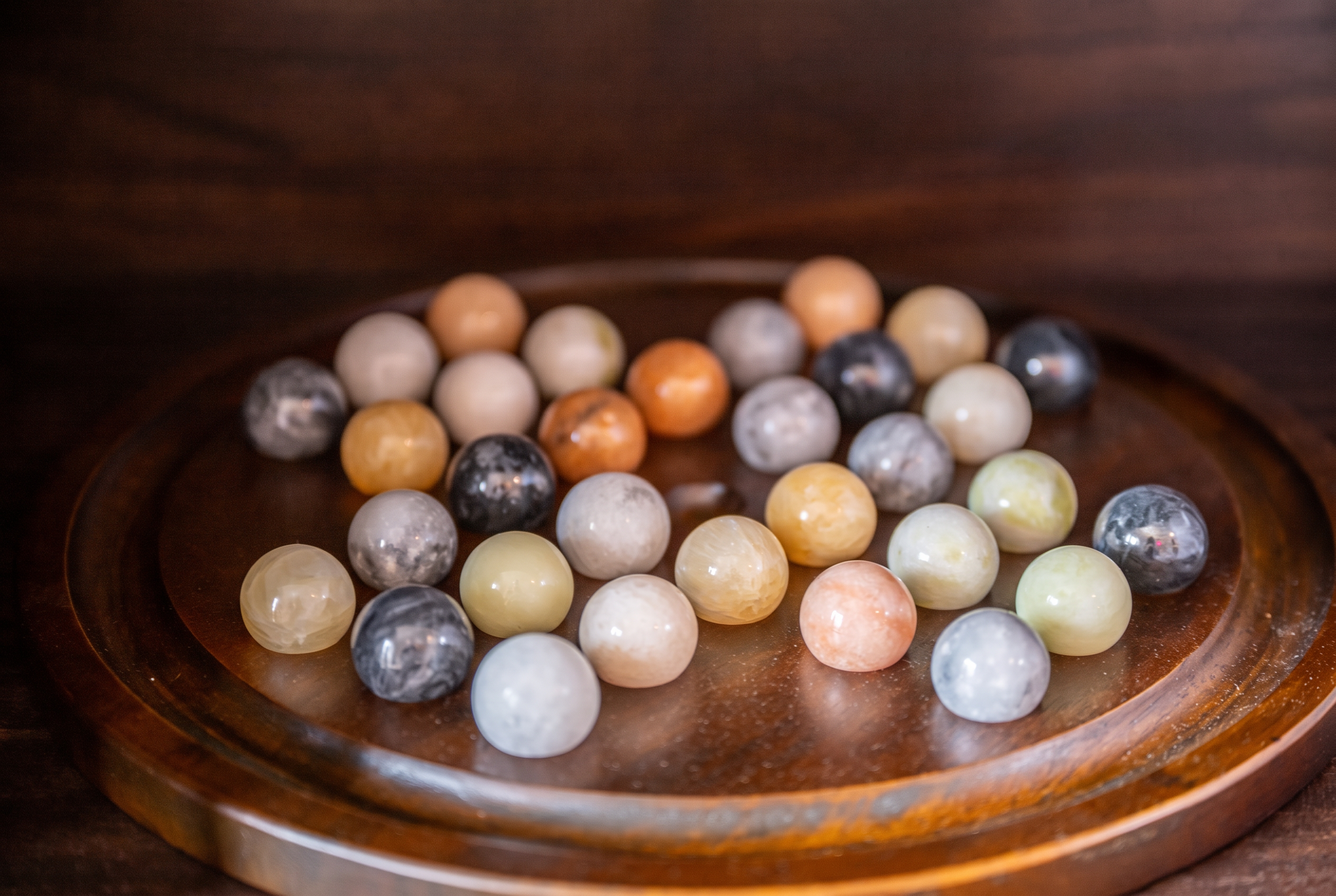 Elegant decorative accents with polished stone spheres and warm wood tones