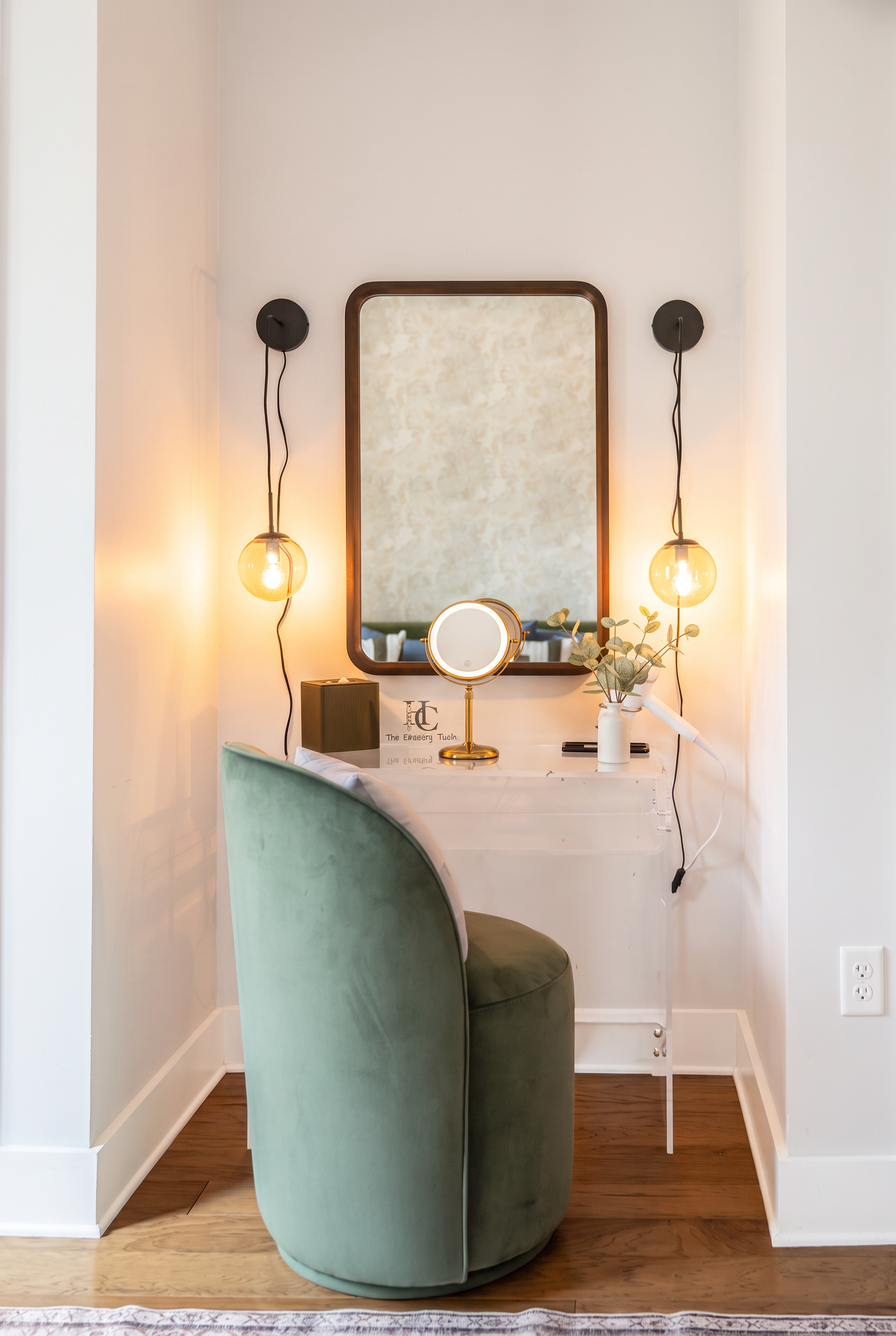 Chic vanity nook with velvet seating and warm ambient lighting
