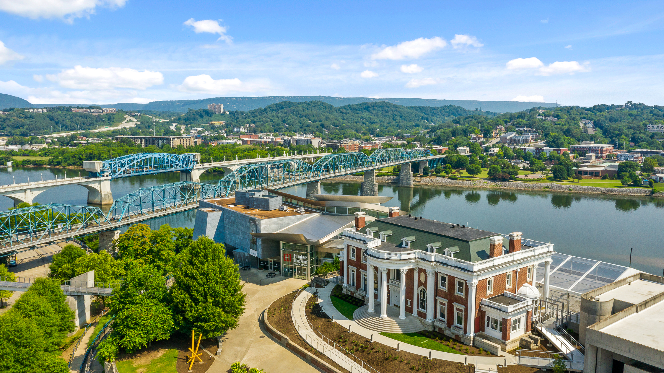 Scenic riverfront and bridge views with a charming city backdrop