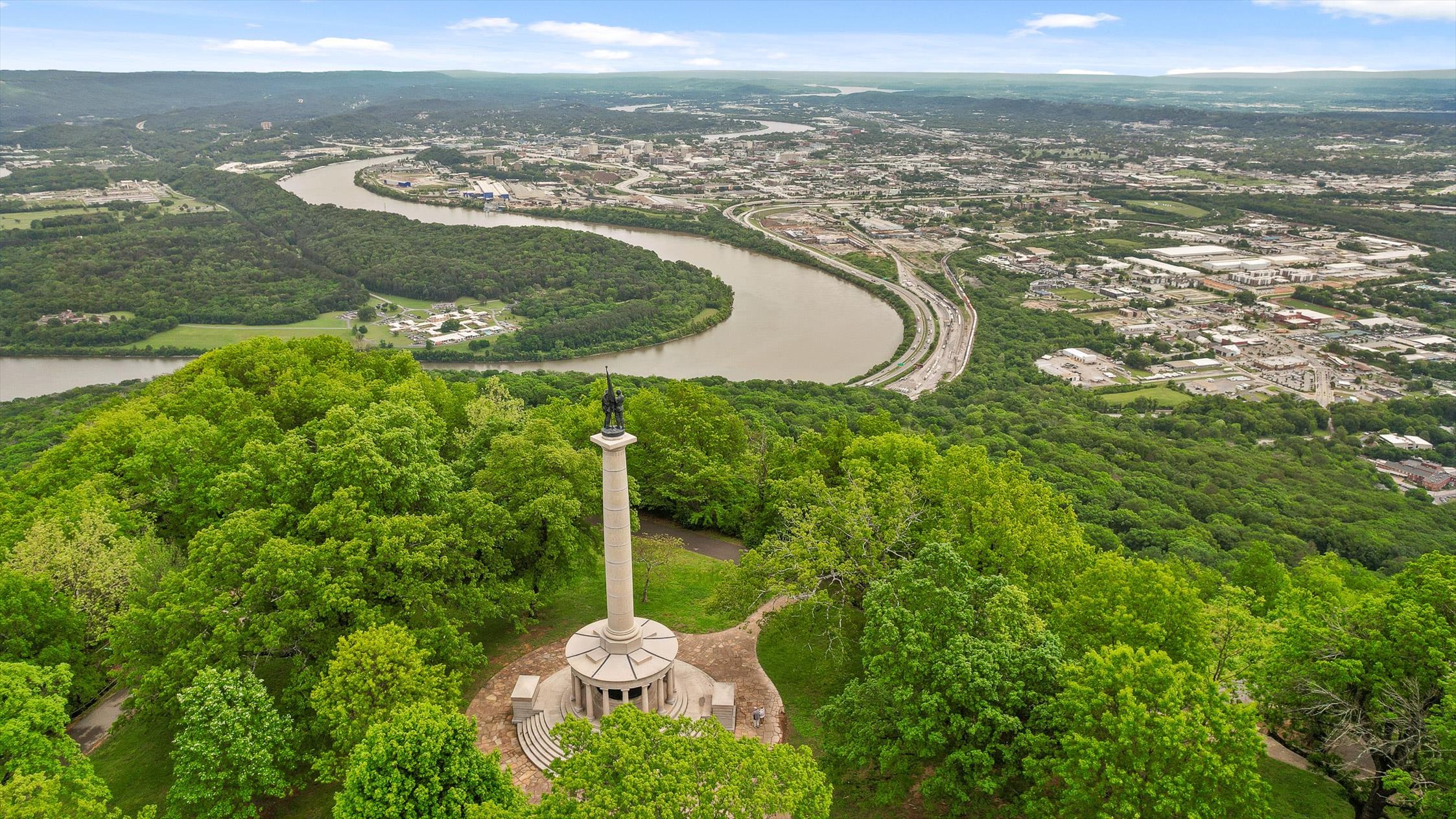 Scenic hilltop monument with sweeping river and city views