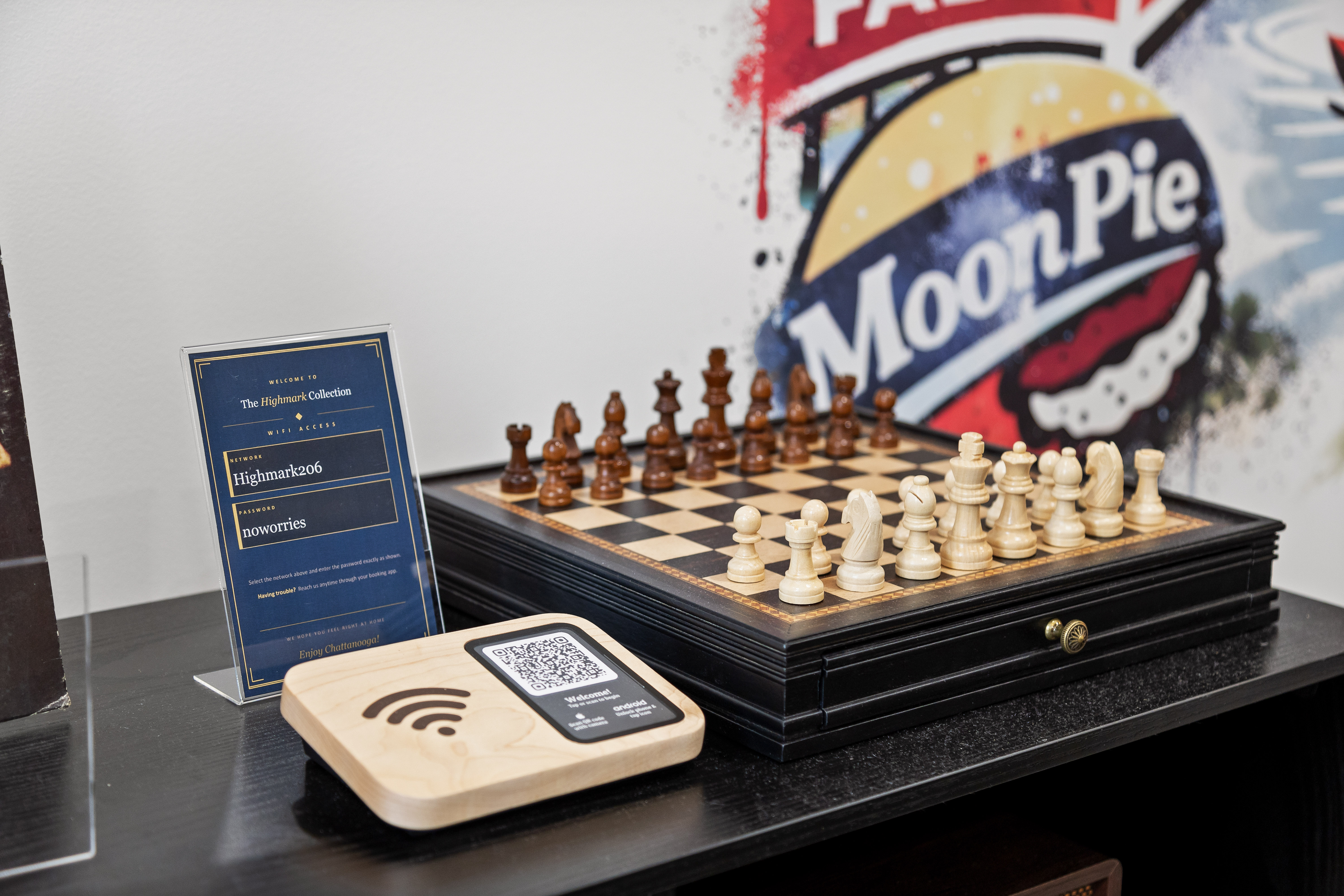 Stylish chess setup with easy Wi-Fi access and playful local artwork