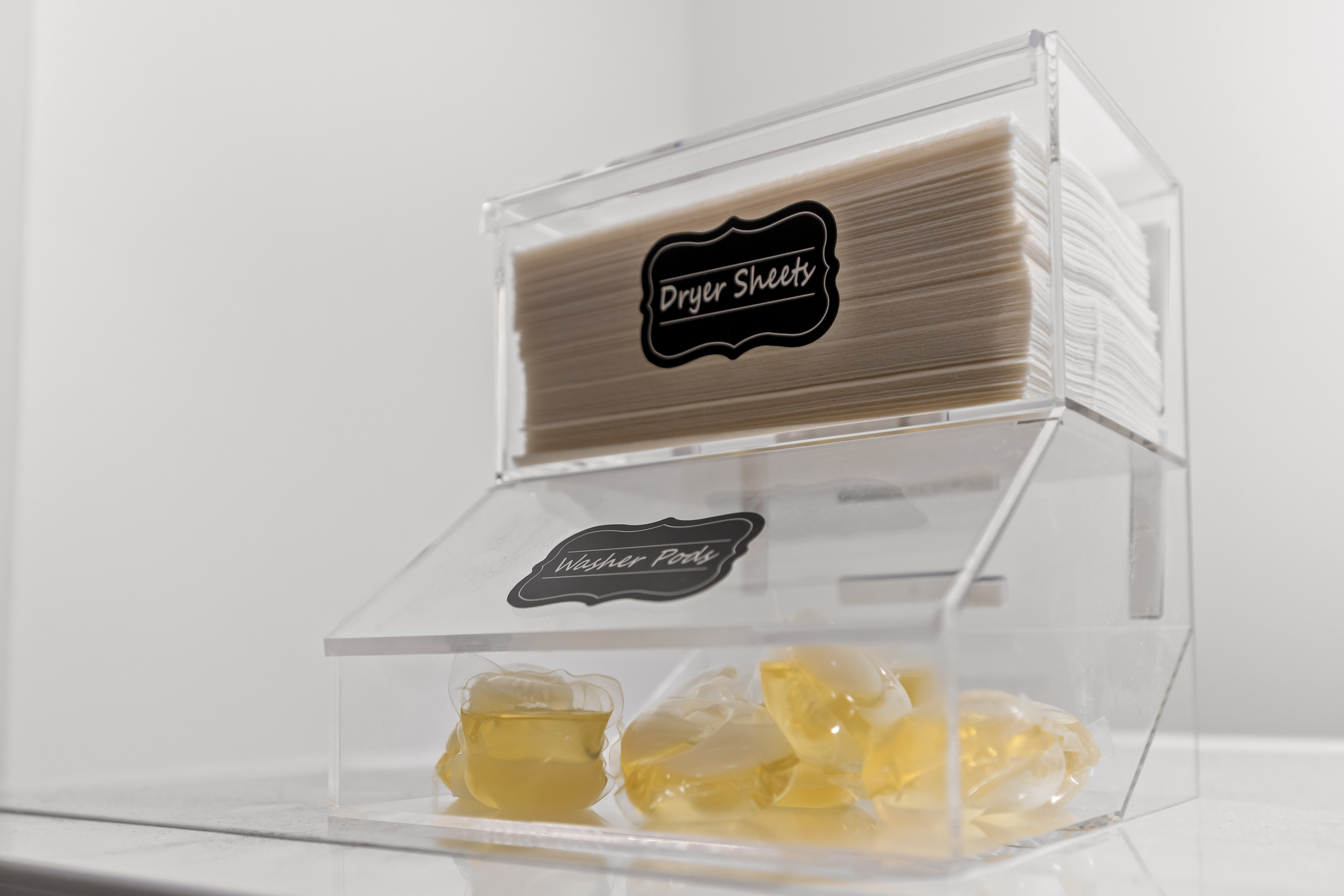 Organized laundry essentials with washer pods and dryer sheets