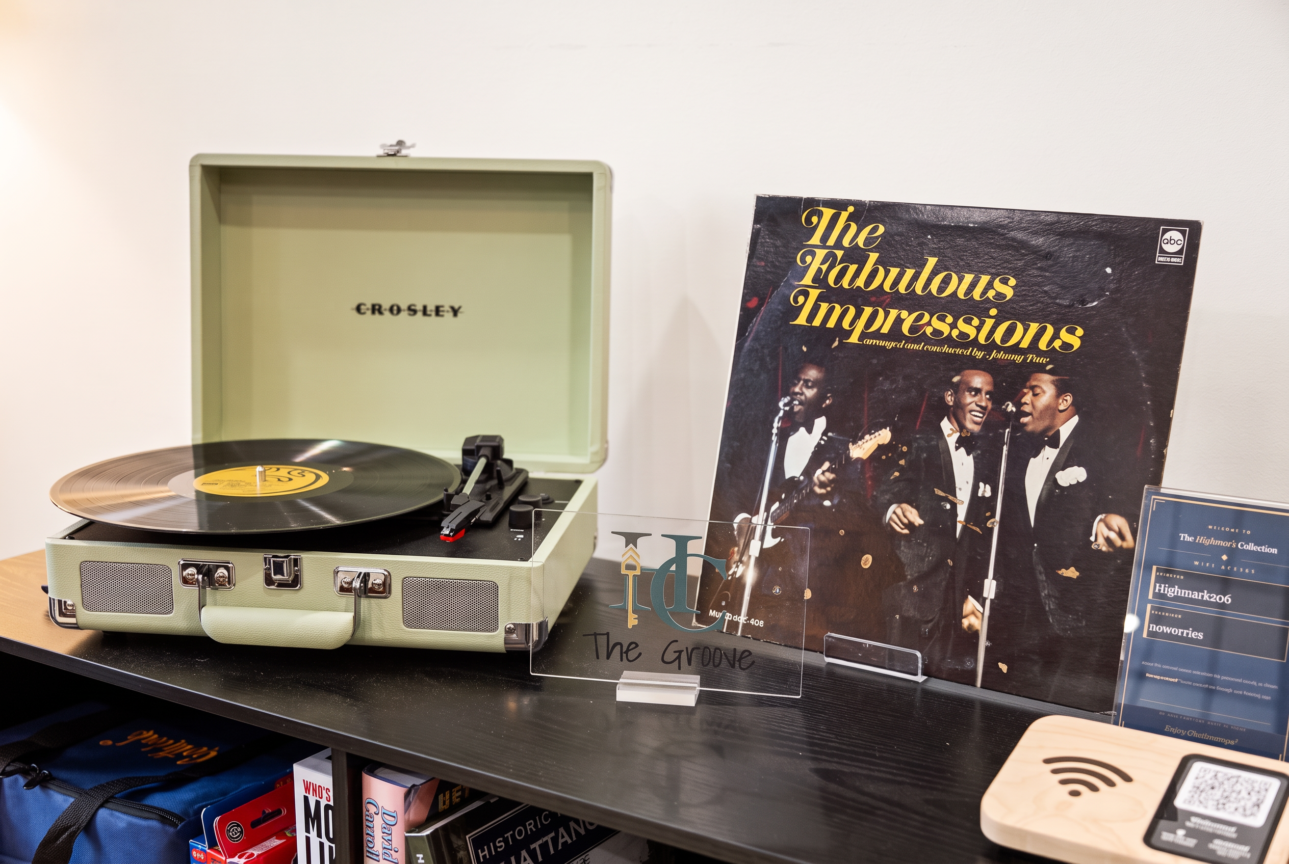 Retro record player corner with vinyl decor and easy Wi-Fi access