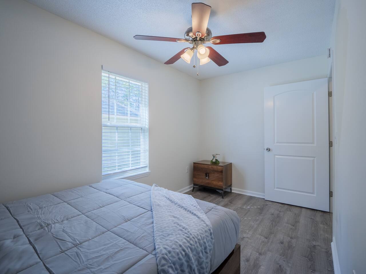 Third bedroom with ceiling fan