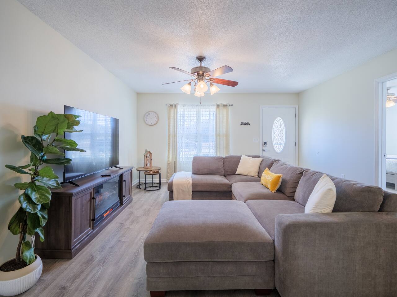 Living room with fiddle-leaf fig and sectional