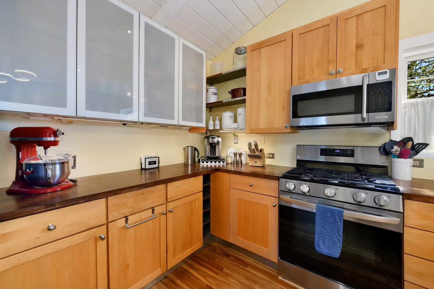 Cozy, chef-ready kitchen with gas range and butcher-block counters