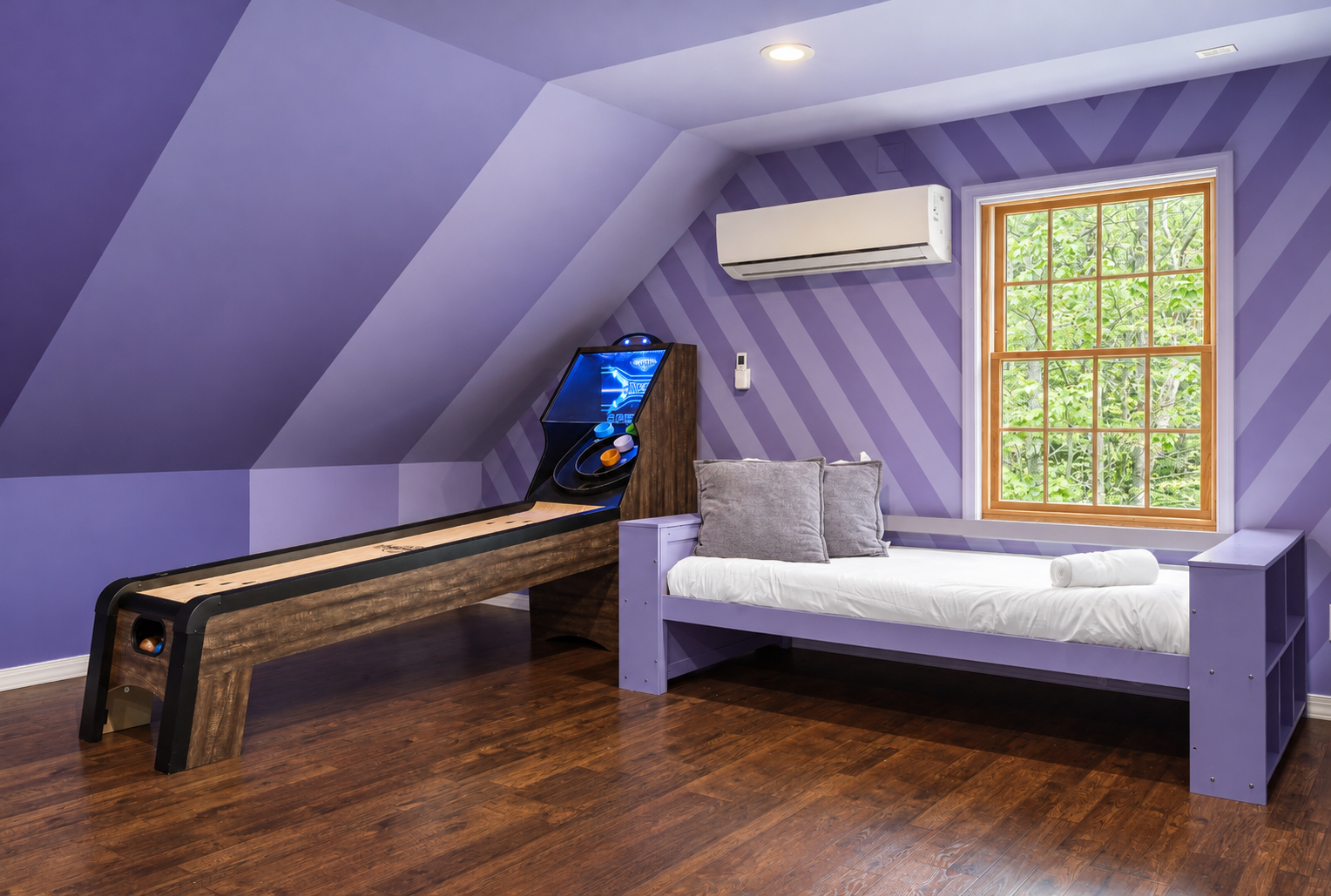 Game loft includes skeeball and a Pac-Man arcade machine
