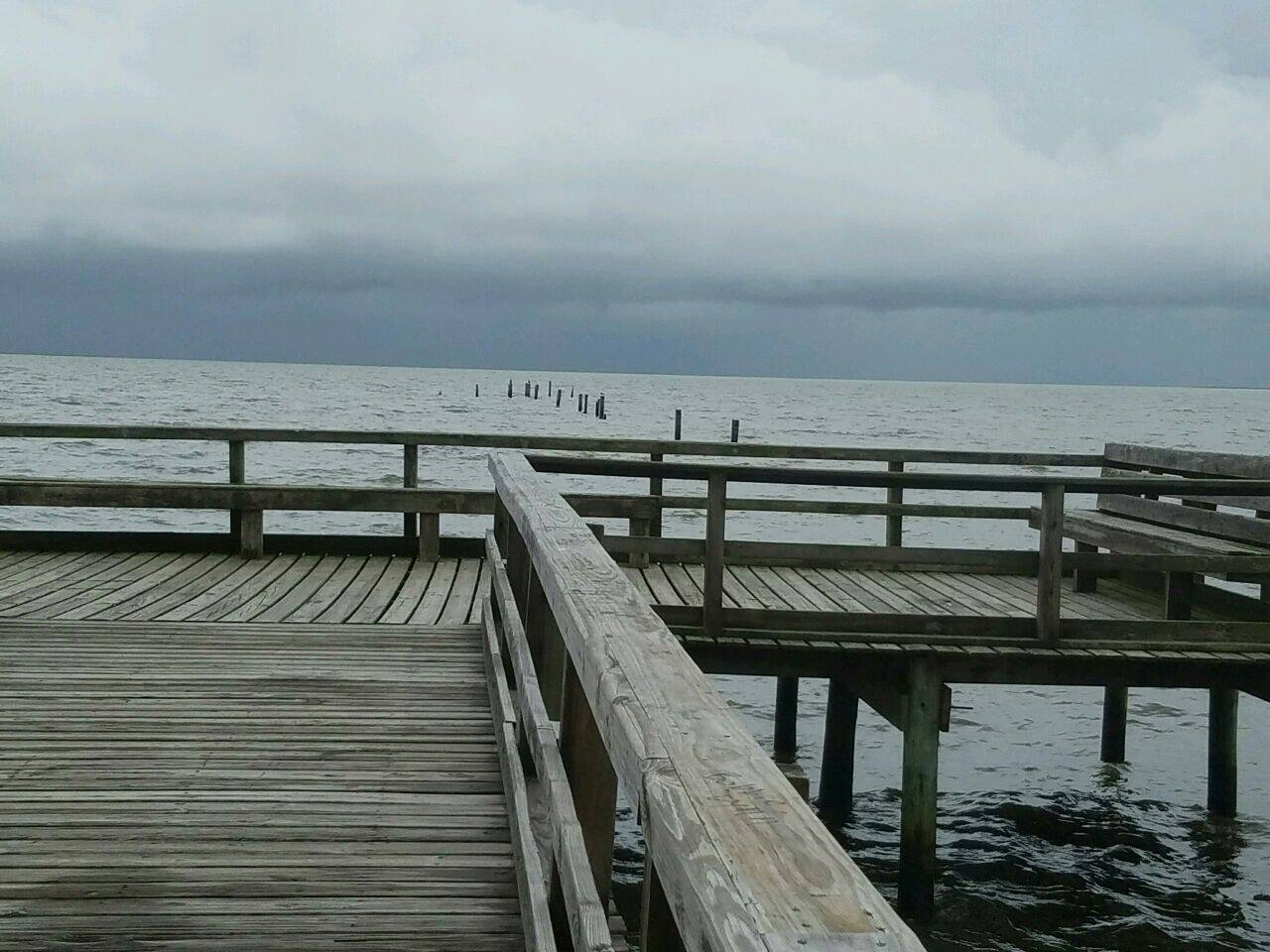 Peaceful mornings on the Dauphin Island pier — perfect for sunrise walks, fishing, or spotting dolphins nearby