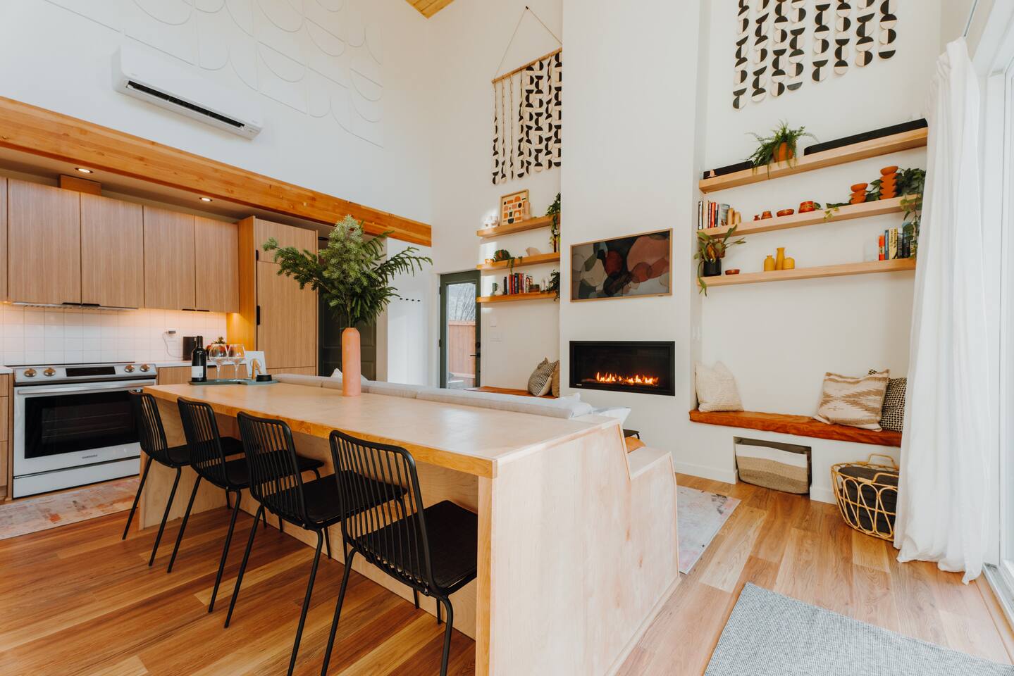 Built-in dining area with gas fireplace and cozy reading nooks