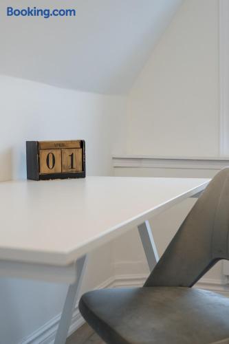 Minimalist desk setup with modern chair for work or trip planning