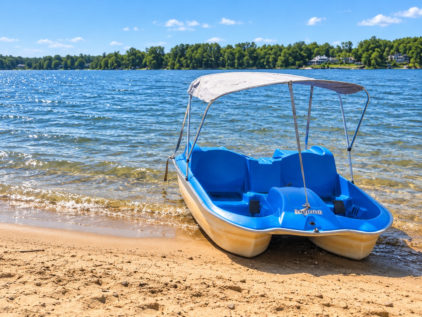 Private sandy lakeshore with pedal boat and sparkling lake views