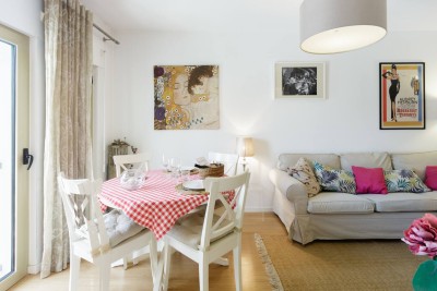 Gather for home-cooked meals in our cozy dining corner, nestled within the living room.